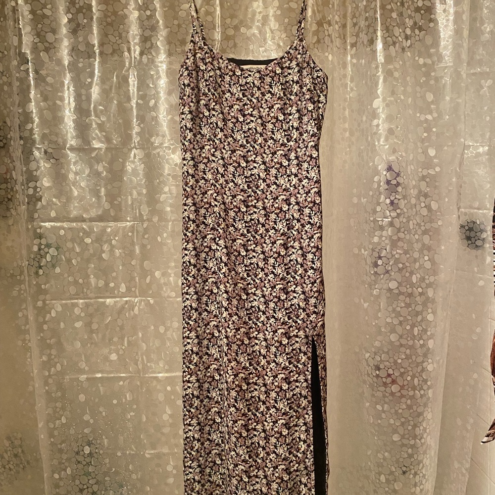 Side zipper, spaghetti straps. Black with lavender lavender white green flowers.